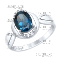 Кольцо из серебра с синим топазом и фианитами