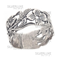 Кольцо серебряное "Цветки"