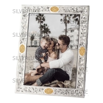 Большая рамка с позолоченными выпиленными вставками 