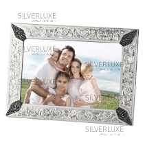 Рамка со вставками из выпиленных узоров 